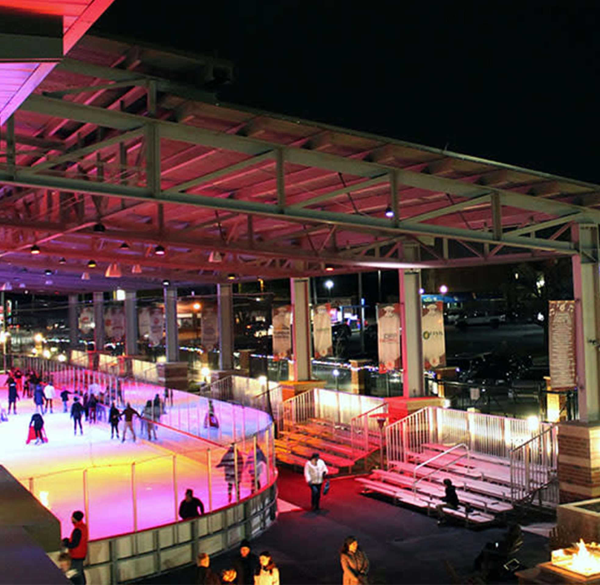 Ice skating rink illuminated at night